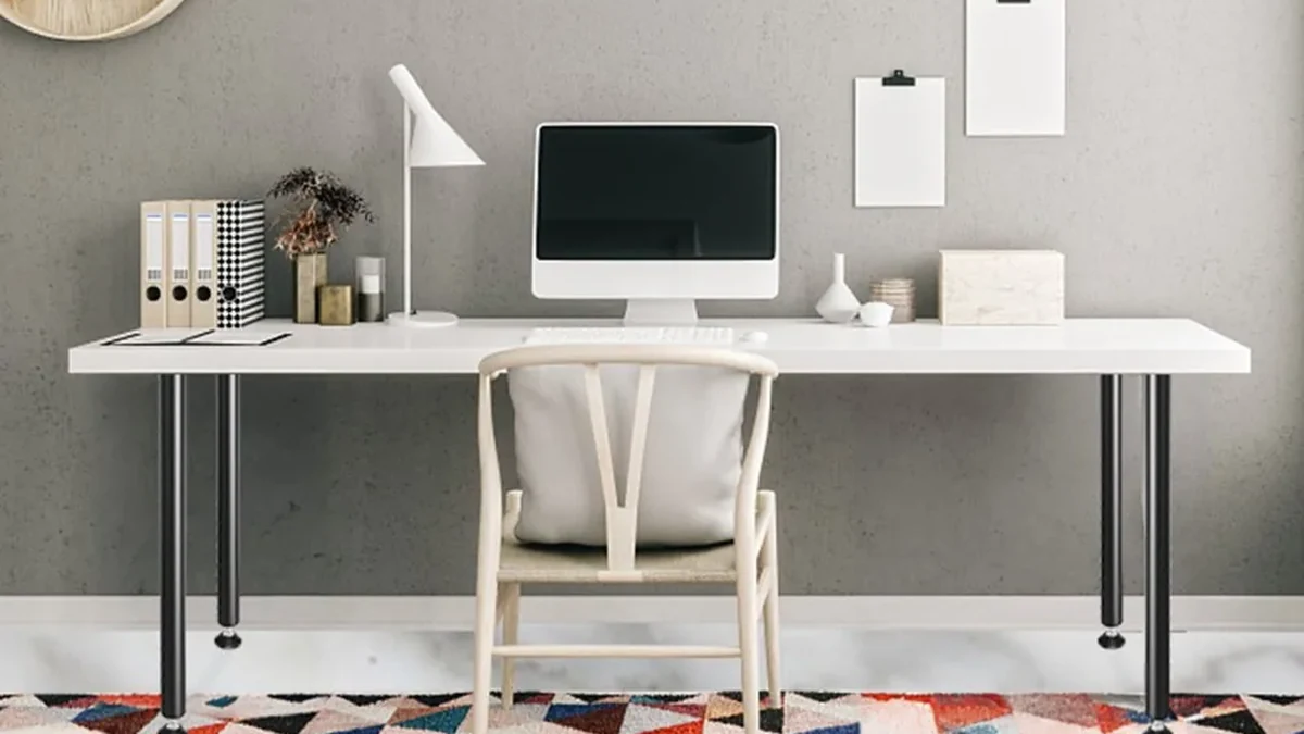 Desk with adjustable legs in a home office
