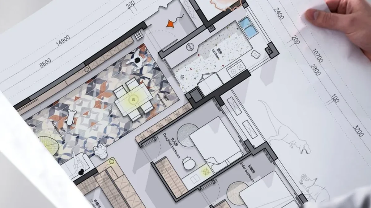Reviewing an architectural floor plan blueprint