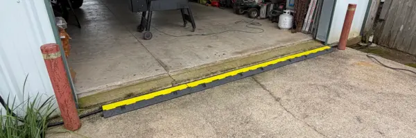 Customer photo 2 of <span class="sdh-h1" data-short="VEVOR 1 Pack 3 Channel Cable Protector Ramp 6,600 lbs">VEVOR Rubber Cable Guard, 3-Channel, 2 x 2.3 in – Durable Cord Protection Ramp for Driveways, 6600 lbs Capacity</span>