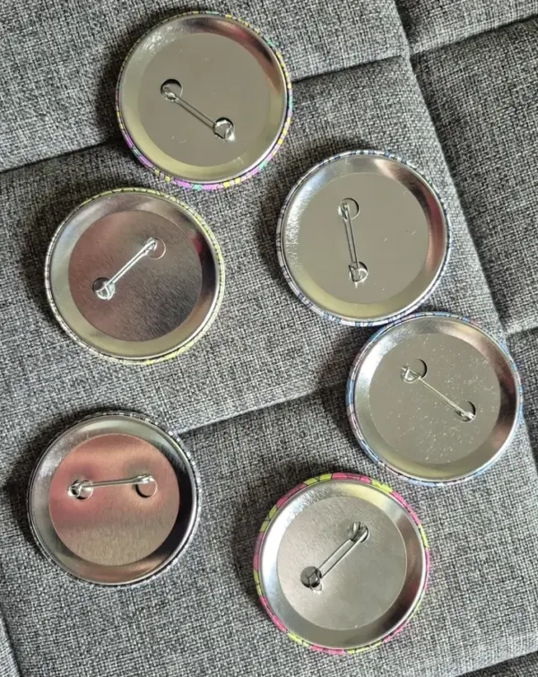 Customer photo 4 of <span class="sdh-h1" data-short="VEVOR Button Maker 1"&1.25"&2.25" Black 300 Pcs">VEVOR Button Maker, 1/1.25/2.28 inch(25/32/58mm) 3-IN-1 Pin Maker, with 300pcs Button Parts, Button Maker Machine with Panda Magic Book, Ergonomic Arc Handle Punch Press Kit, For Children DIY Gifts</span>
